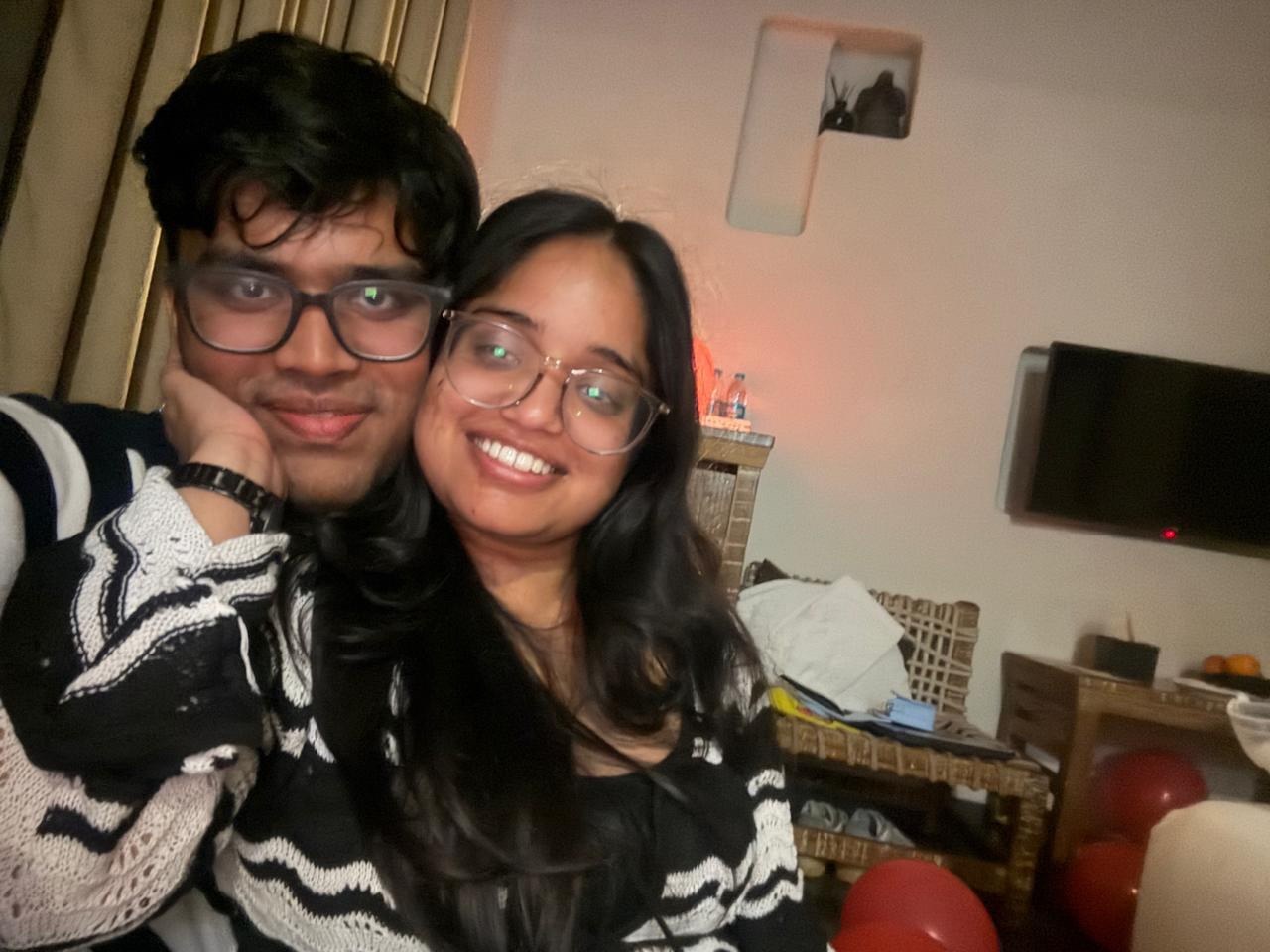 Couple smiling together indoors